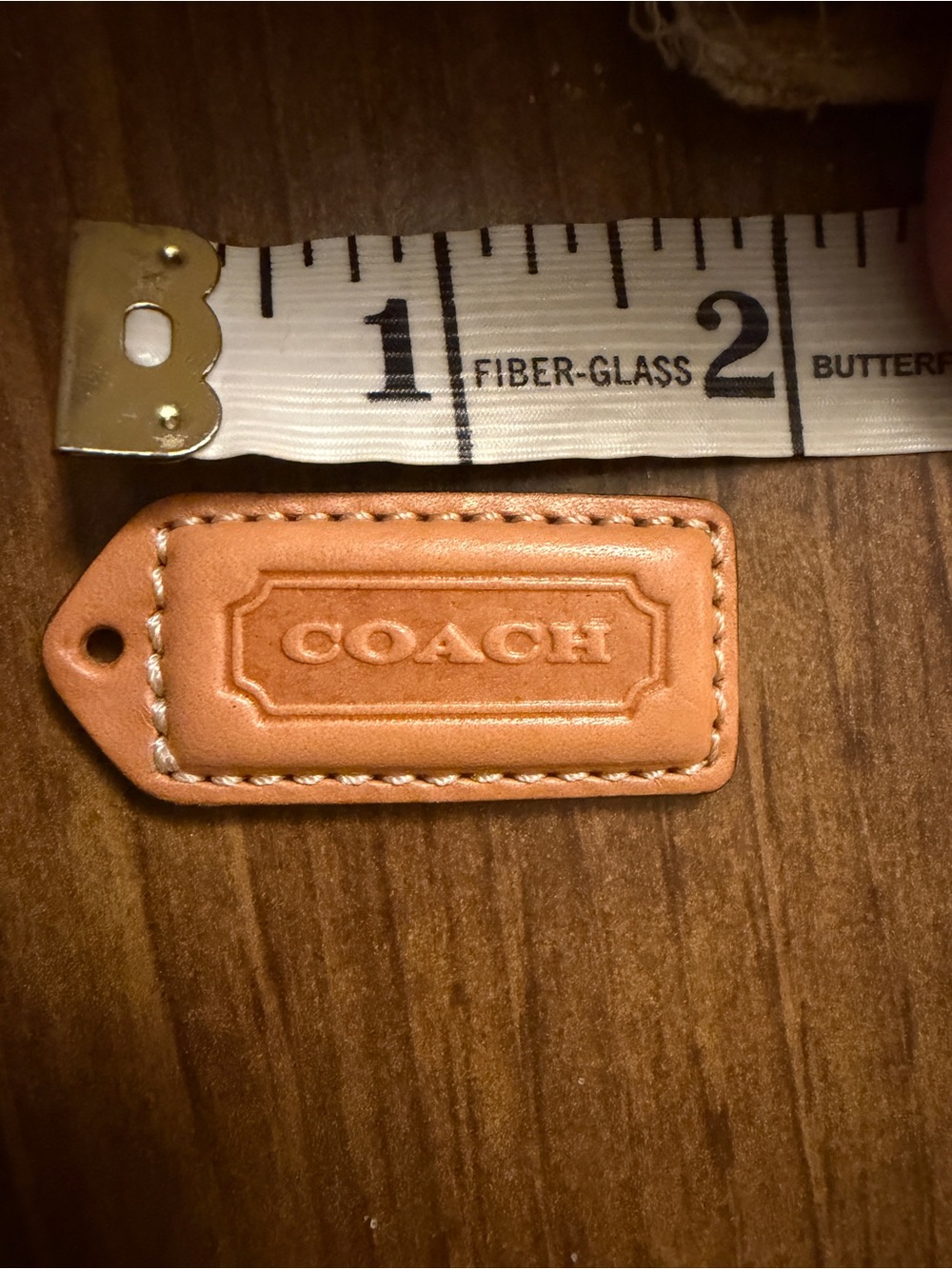 COACH Tan Vachetta Leather Key Tag - Signature Embossed